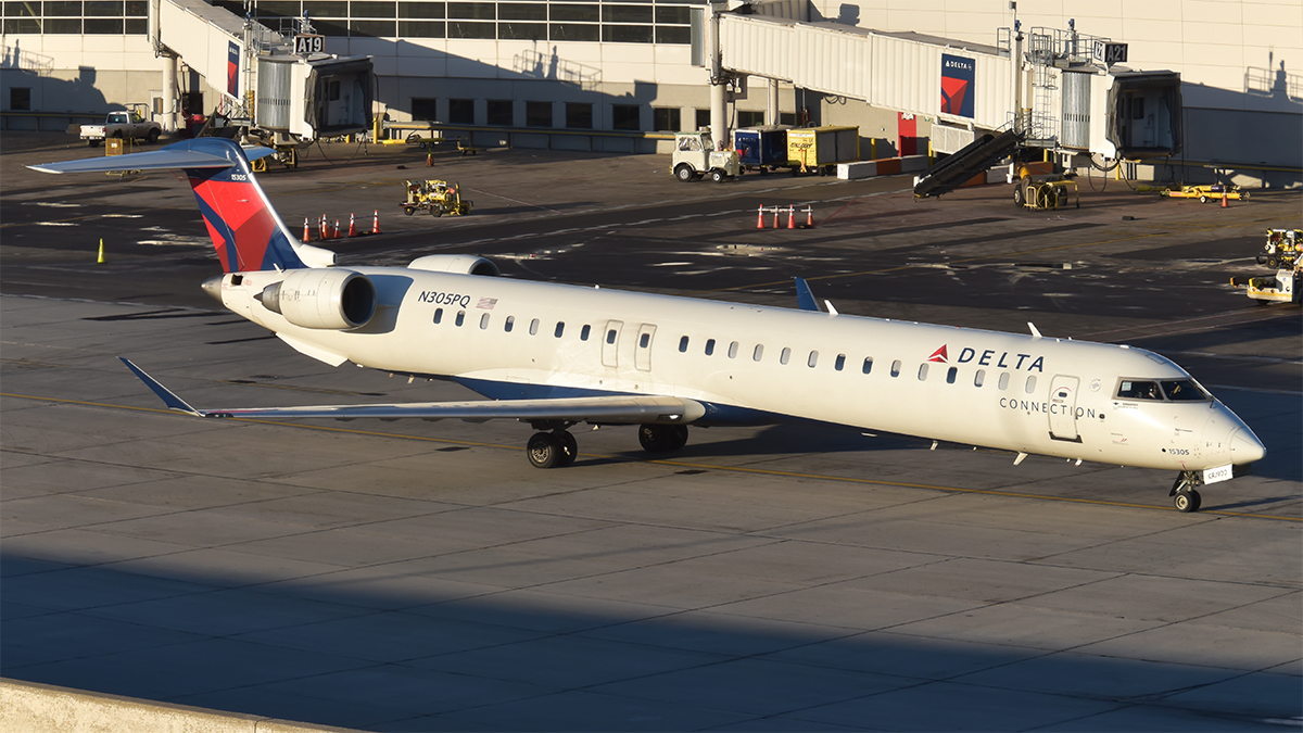 Full size: Delta Connection Mitsubishi CRJ-900 N305PQ at Detroit Metro Wayne County Airport